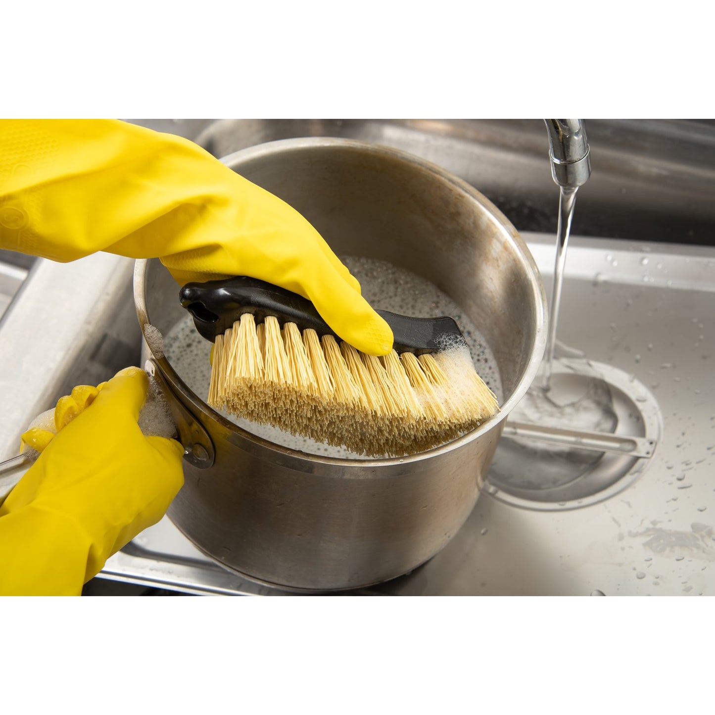 Carlisle 36501500 6" x 2-1/2" Black Sparta Curved Back Hand Scrub Utility Brush With Polypropylene Bristles