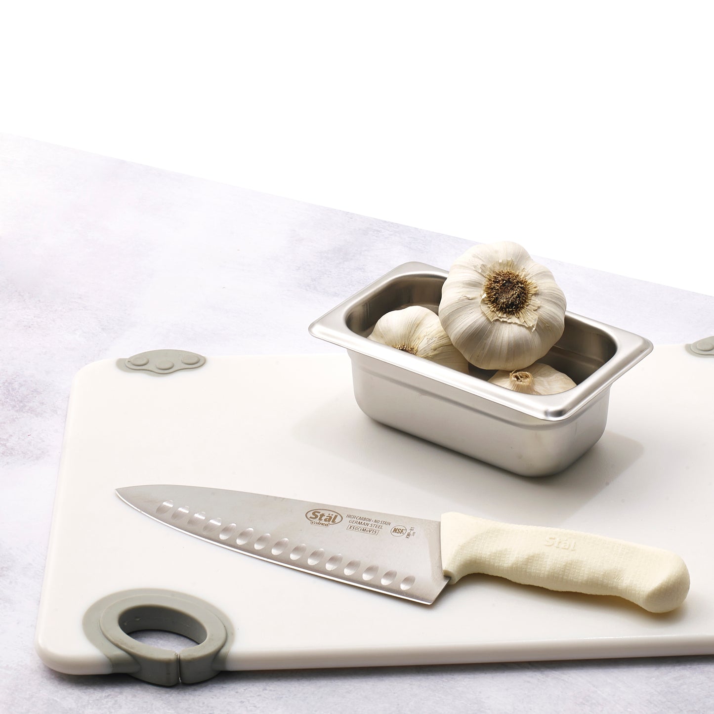 Winco KWP-81 8" White Polypropylene Handle Hollow Ground Cook's Knife