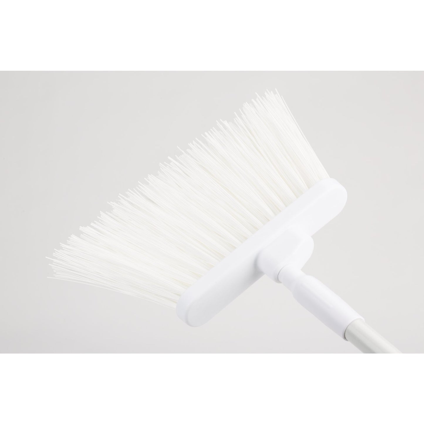 Carlisle 41083EC02 56" White Color Coded Duo-Sweep Unflagged Angle Broom